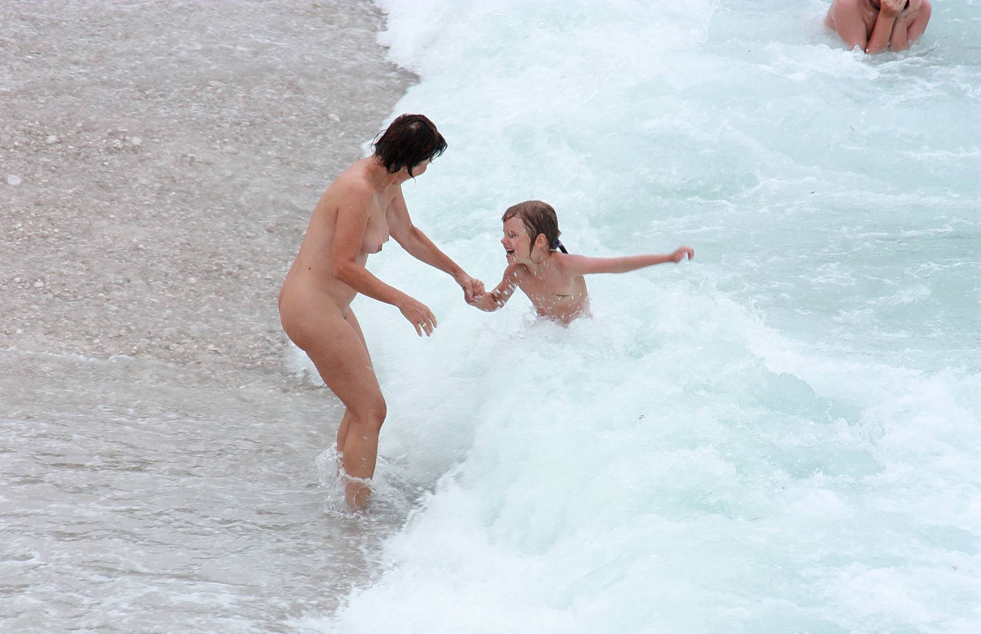 Wading In Coastal Waves - Pure Nudism Pics - 1