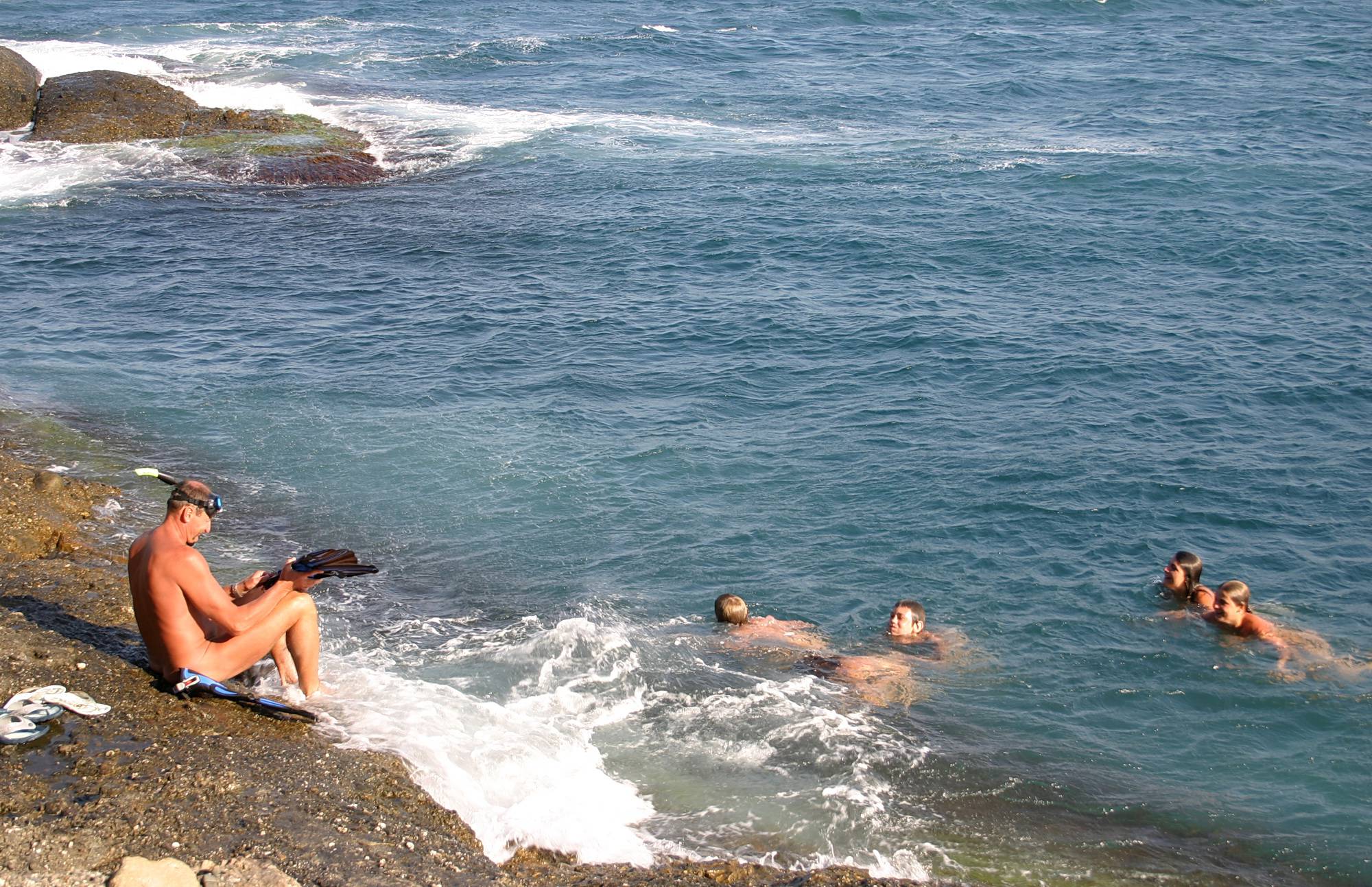Swim By The Rocky Shore - Nudist Pictures - 1